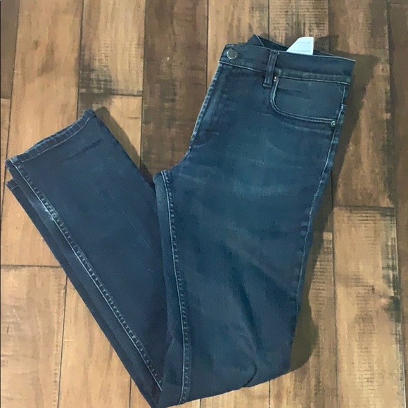 tight dark blue jeans